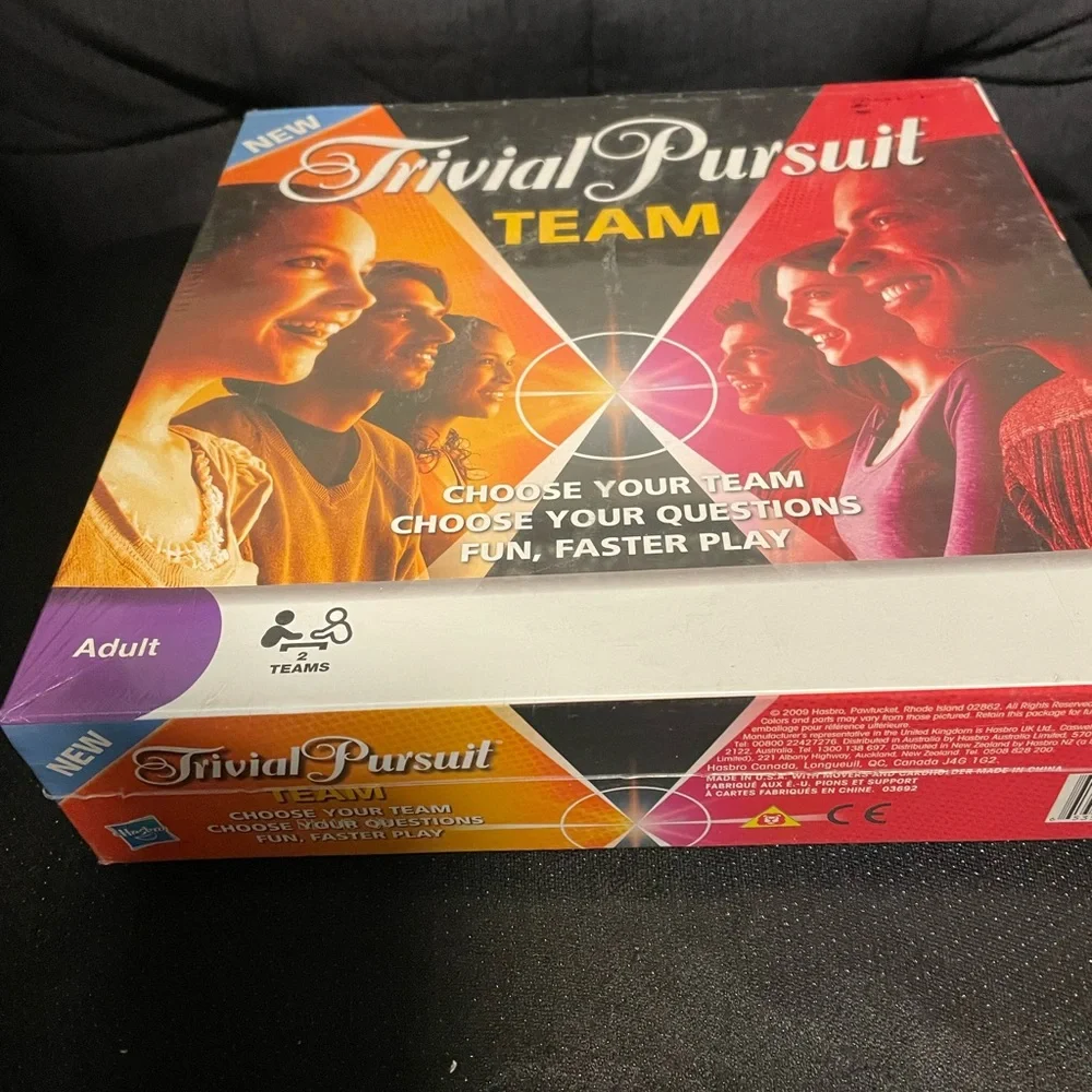 Hasbro Trivial Pursuit Team Game - Red, Orange, Black - Picture 3 of 5